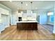Kitchen features a central island, stainless steel appliances and ample cabinet space at 3850 Willow Grove Ln # 24, Concord, NC 28025