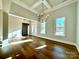 Bright living room featuring hardwood floors, recessed lighting, and a modern chandelier at 3850 Willow Grove Ln # 24, Concord, NC 28025