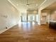 Bright, expansive living room with beautiful hardwood flooring at 3850 Willow Grove Ln # 24, Concord, NC 28025