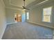 Main bedroom with carpet, a ceiling fan, and an ensuite bathroom at 3850 Willow Grove Ln # 24, Concord, NC 28025