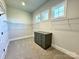 Spacious walk-in closet featuring carpeted floors, wire shelving, and a center storage unit with gray drawers at 3850 Willow Grove Ln # 24, Concord, NC 28025