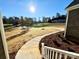 View from the porch out to a lush lawn and beautiful mature trees at 3850 Willow Grove Ln # 24, Concord, NC 28025