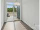 Bright dining room with sliding glass door leading to outdoor space at 5527 Stafford Rd # 34, Charlotte, NC 28215