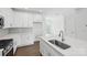 Kitchen with stainless steel appliances and brick backsplash at 5527 Stafford Rd # 34, Charlotte, NC 28215