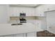 Modern kitchen with stainless steel appliances and white cabinets at 5527 Stafford Rd # 34, Charlotte, NC 28215