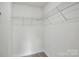 Walk-in closet featuring wire shelving, providing ample storage space at 5527 Stafford Rd # 34, Charlotte, NC 28215