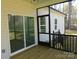 View of screened-in back porch with glass sliding door at 1647 Davis Farm Rd, York, SC 29745