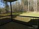 View from back porch looking out to the treed yard at 1647 Davis Farm Rd, York, SC 29745
