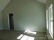 Bright bedroom with large windows, light walls, and vinyl flooring at 1647 Davis Farm Rd, York, SC 29745