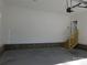 Two car garage featuring clean walls, brick wainscoting and access to the main house at 1647 Davis Farm Rd, York, SC 29745