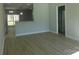 Bright and airy living room showing access to the kitchen and hallway at 1647 Davis Farm Rd, York, SC 29745