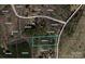 A real estate map highlights the property's boundaries, surrounded by dense trees, and nearby neighborhood at 1647 Davis Farm Rd, York, SC 29745