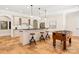 Entertaining space featuring a bar, foosball table and barstool seating at 1716 Funny Cide Dr, Waxhaw, NC 28173