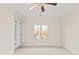 Bedroom featuring an empty bookshelf and a large window with plenty of natural light at 1716 Funny Cide Dr, Waxhaw, NC 28173