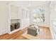 Walk-in closet featuring custom shelving, drawers, and a window for natural light at 1716 Funny Cide Dr, Waxhaw, NC 28173