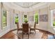 Charming dining area with natural light, and hardwood floors at 1716 Funny Cide Dr, Waxhaw, NC 28173