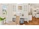 Dining room area boasts custom cabinets, built-in desk, and seating at 1716 Funny Cide Dr, Waxhaw, NC 28173