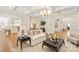 Spacious living room featuring hardwood floors, and an open concept layout at 1716 Funny Cide Dr, Waxhaw, NC 28173