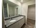Double vanity bathroom with granite countertop at 174 Salem Springs Ln, Statesville, NC 28625