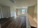 Spacious loft area with hardwood floors and a window at 174 Salem Springs Ln, Statesville, NC 28625