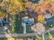 Birds eye view of a landscaped home with a driveway and surrounding trees at 204 Jonas Dr, Lincolnton, NC 28092