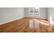 Bedroom with hardwood floors and natural light and view to the backyard at 204 Jonas Dr, Lincolnton, NC 28092