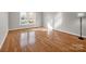 Bright bedroom with hardwood floors, natural light and a view to the outside at 204 Jonas Dr, Lincolnton, NC 28092