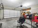 Spacious two-car garage with ample storage space and a large garage door at 204 Jonas Dr, Lincolnton, NC 28092