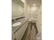 Bathroom featuring a dual vanity sink with granite countertop and modern fixtures at 282 New Salem Rd, Statesville, NC 28625