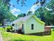 Charming single Gathering home with mature trees and lush green lawn at 606 Carver St, Kannapolis, NC 28083