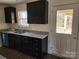 Kitchen with granite countertop and double sink at 156 Hinton St, Chester, SC 29706