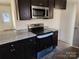 Kitchen with granite countertop and stainless steel appliances at 156 Hinton St, Chester, SC 29706