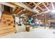 Unfinished basement with exposed beams, brick walls, and storage at 2351 Hudspeth Rd, Catawba, NC 28609