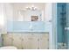 Bathroom with light blue tile and vintage vanity at 2351 Hudspeth Rd, Catawba, NC 28609