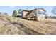 House exterior showcasing a deck and sunroom addition at 2351 Hudspeth Rd, Catawba, NC 28609