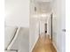 Long hallway with light walls and wood-look flooring at 2351 Hudspeth Rd, Catawba, NC 28609
