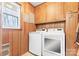 Bright laundry room, featuring washer, dryer, and ample cabinet space at 2351 Hudspeth Rd, Catawba, NC 28609