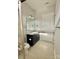 Bathroom featuring glass shower, dark cabinets and sink at 405 Northgate Blvd, Indian Trail, NC 28079