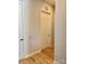 Hallway with modern doors and wood-style flooring; bright and inviting at 405 Northgate Blvd, Indian Trail, NC 28079