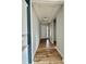 Bright hallway featuring beautiful flooring, paint and trim at 405 Northgate Blvd, Indian Trail, NC 28079