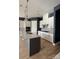 Modern kitchen with white cabinets, granite countertops, stainless steel appliances, and pendant lighting at 405 Northgate Blvd, Indian Trail, NC 28079
