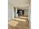 Open-concept living space with modern kitchen and beautiful wood flooring at 405 Northgate Blvd, Indian Trail, NC 28079