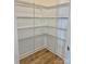 Large pantry with abundant metal shelving for organized storage; perfect for any modern home at 405 Northgate Blvd, Indian Trail, NC 28079