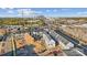 An aerial view shows new townhome construction near the city skyline and major roadways at 6025 Countess Dr # 54, Charlotte, NC 28217
