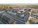 Aerial view of modern townhome development showcasing location near green spaces and businesses at 6025 Countess Dr # 54, Charlotte, NC 28217