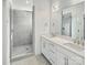 Bathroom featuring a walk-in shower, and double vanity at 6025 Countess Dr # 54, Charlotte, NC 28217