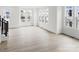Spacious living room with bright windows and hardwood floors at 6025 Countess Dr # 54, Charlotte, NC 28217
