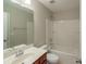 Bathroom featuring a vanity, mirror, toilet, and shower-tub combo at 7108 Kinley Commons Ln, Charlotte, NC 28278