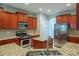 Kitchen with granite countertops, stainless steel appliances, and lots of storage space at 7108 Kinley Commons Ln, Charlotte, NC 28278