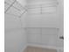 Walk-in closet with wire shelving and carpeted floor at 13024 Moon Rd # 44, Charlotte, NC 28277